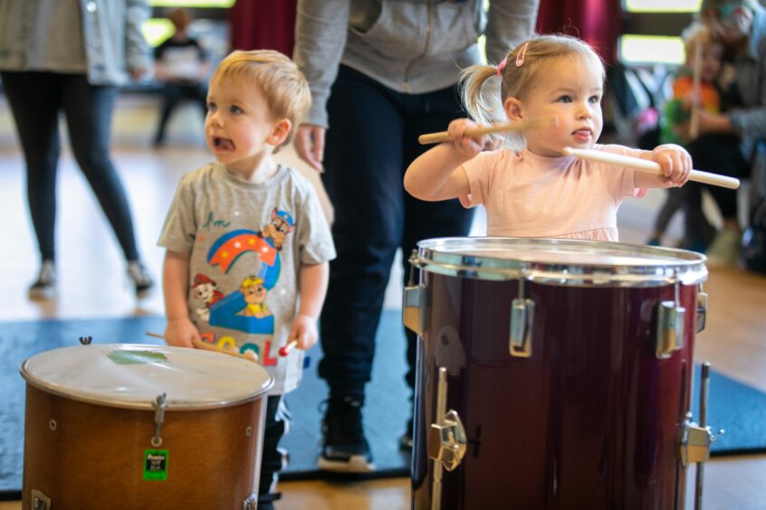 Layton MacPhail, 2, from Kennoway with Scarlett Gerard, 2, doing some drumming