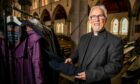 The Rev Canon Kenneth Gibson at St Mary Magdalene's Church, Dundee, which is giving out free coats. Image: Steve Brown / DC Thomson
