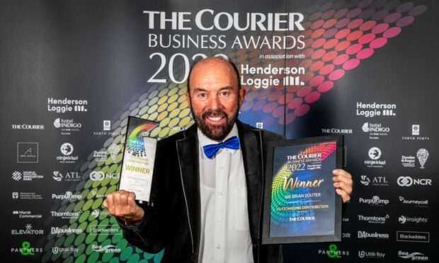 Sir Brian Souter, co-founder of Stagecoach, with his Outstanding Contribution award. Image: Steve Brown/DC Thomson.
