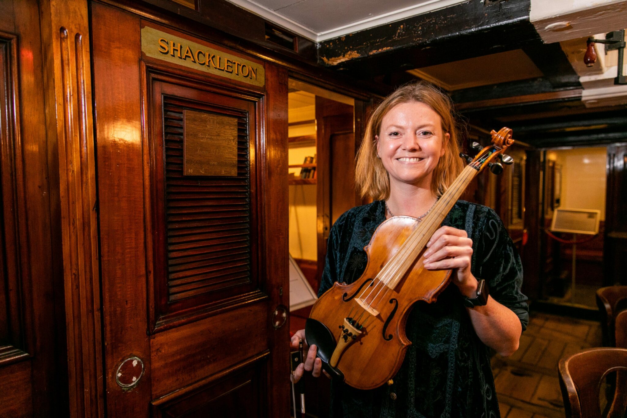 Steve Shackleton Shackleton relative plays violin on board RRS Discovery in Dundee