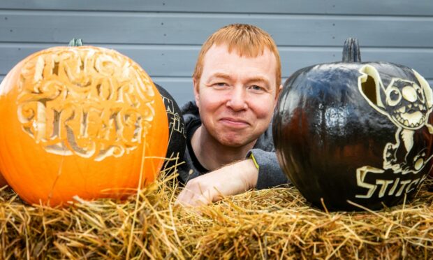 Pumpkin carving expert James Phimister with some of this creations.