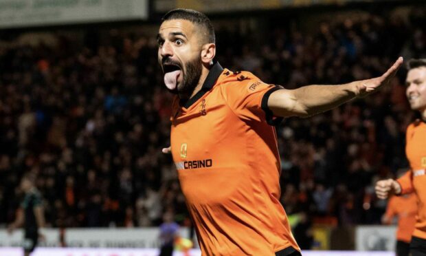 Aziz Behich celebrates one of his four Dundee United goals