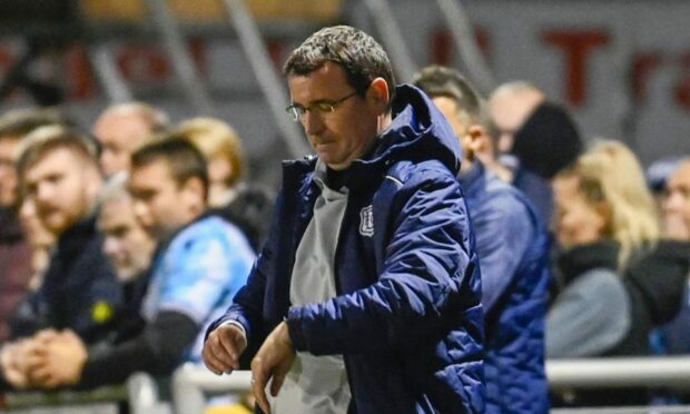 Dundee boss Gary Bowyer watches his side defeated at Cove Rangers. (Image: SNS).