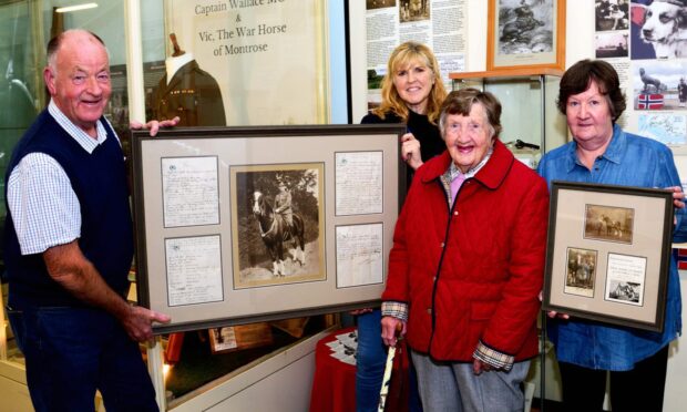 David McGregor, Sian Brewis of MASHC, Jean McGregor and Shona McComb with the war letters. Image: Neil Werninck.