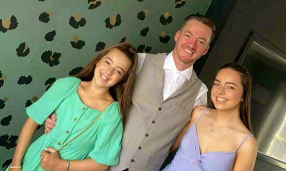 Brian Glendinning with his daughters, Lexi and Heidi.
