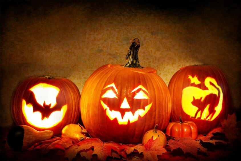 Three Halloween Pumpkin lanterns