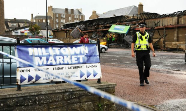 The aftermath of the Hilltown Market fire.