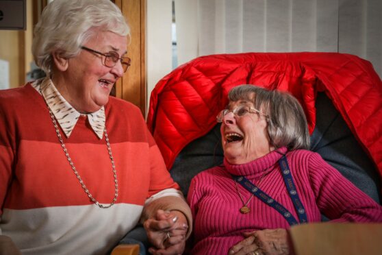 Forfar Day Care Centre vice-chairperson Liz Ross enjoys a laugh with 79-year-old Evelyn Balfour.