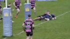 Tom Hall scores the first of his two tries for Dundee Rugby.