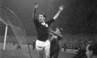 Alan Gilzean celebrates scoring one of his many Dundee goals. Image: DCT