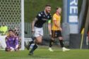 Dundee captain Ryan Sweeney celebrates against Partick Thistle (Image: David Young/ Shutterstock)