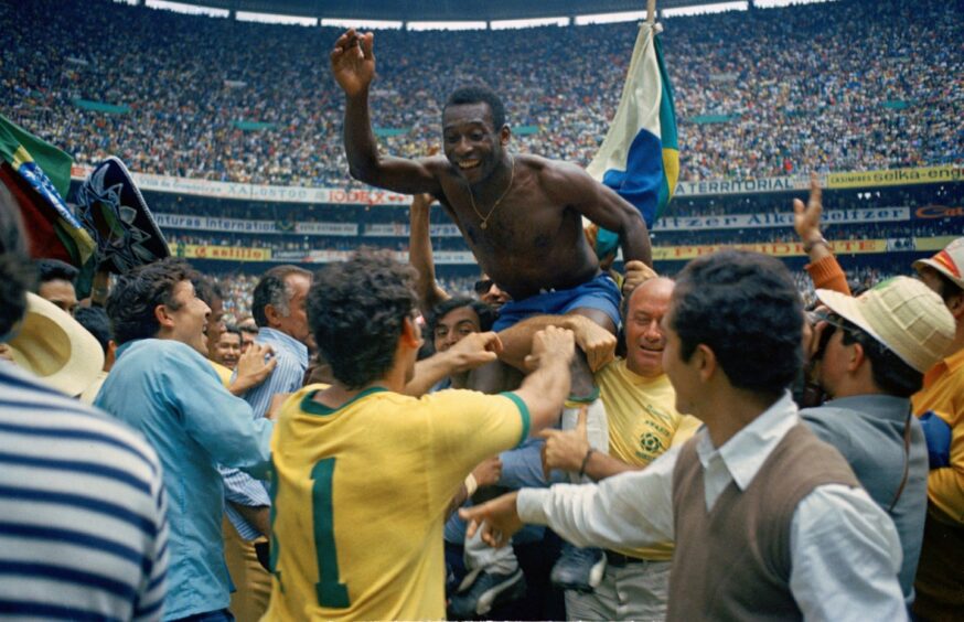 photo shows Pele being carried on the shoulders of his Brazil team-mates at the 1970 World Cup.