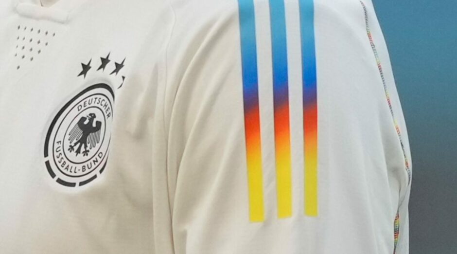 photo shows rainbow stripes on the warm-up shirt of Germany's Kai Havertz at the World Cup in Qatar.