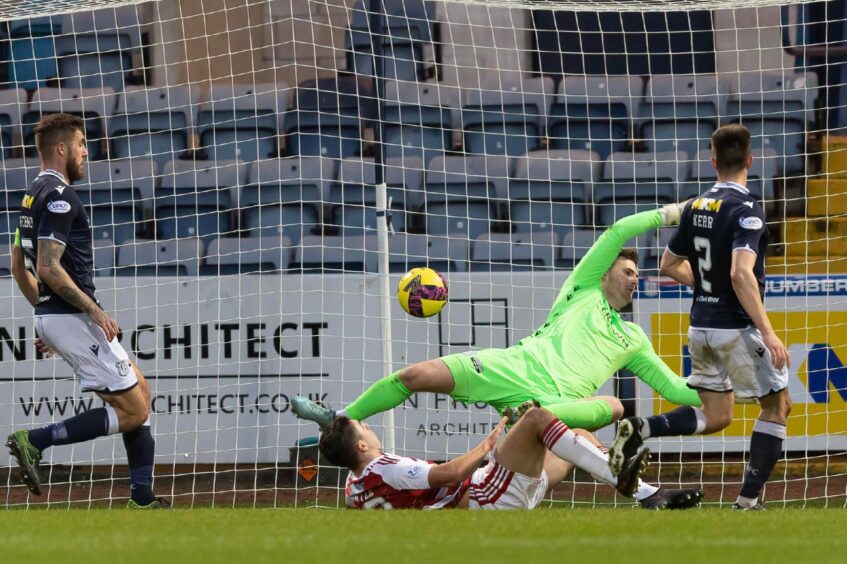 Dundee goalkeeper Ian Lawlor pulls off a fantastic save to deny Andy Winter. 
