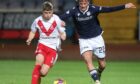 Ben Williamson takes on Airdrieonians. Image: David Young/Shutterstock.