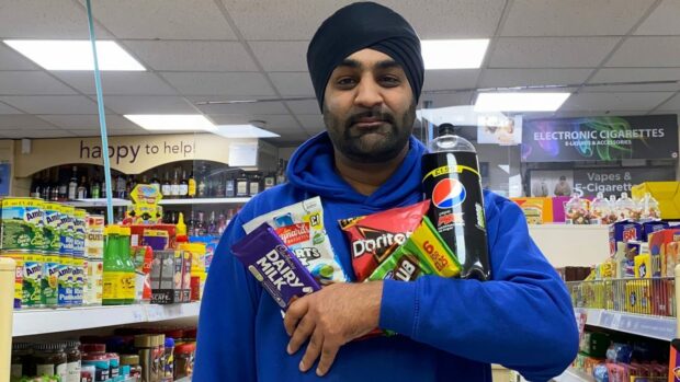 Premier owner Surjeet Singh Notay with items in the 1966 prices promotion.