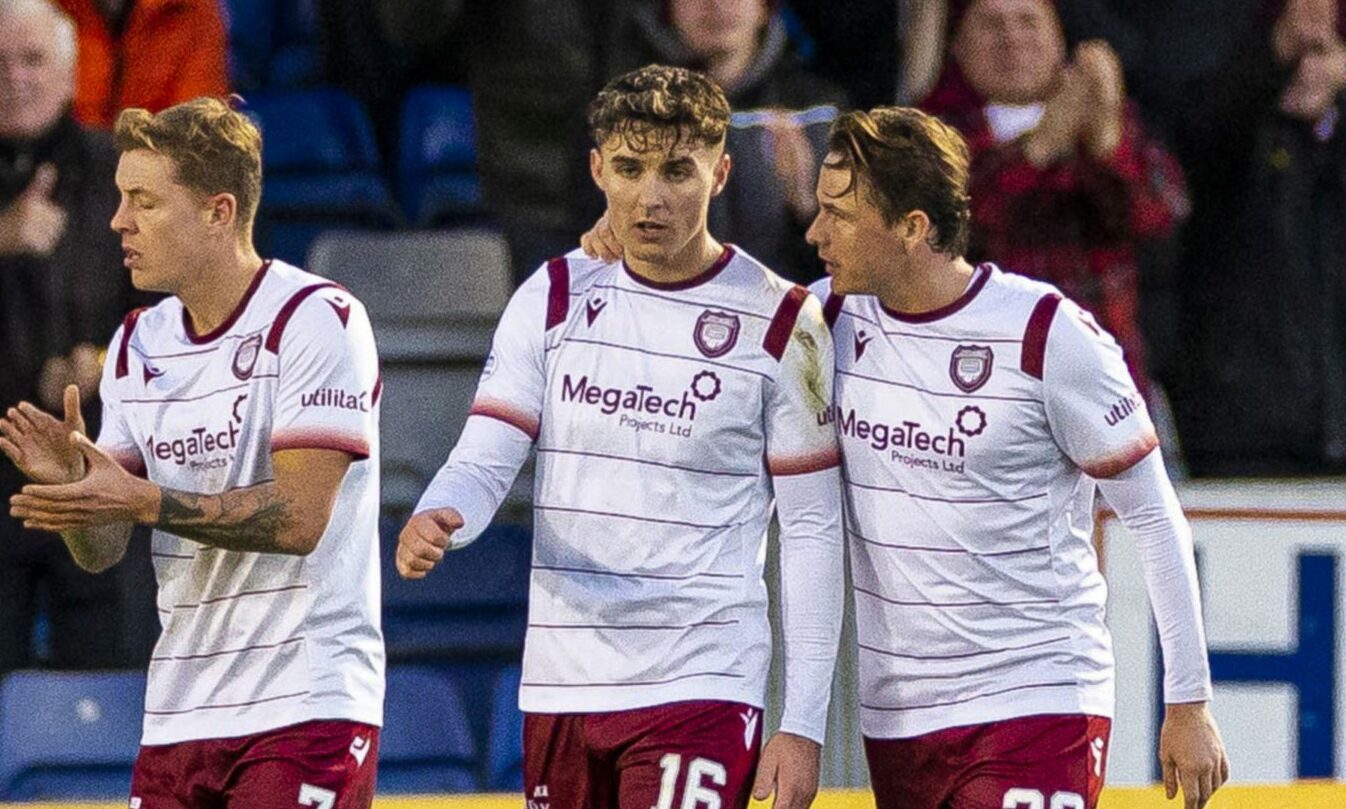 Kieran Shanks (centre) is congratulated by Scott Allan after his goal. Image: SNS
