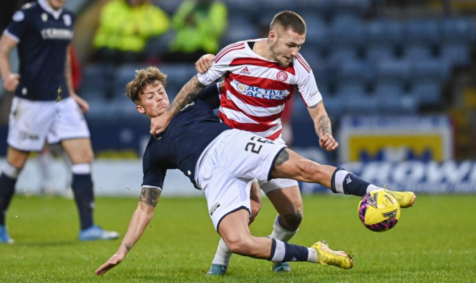 Ben Williamson battles against Hamilton midfielder Scott Martin. Image: SNS.