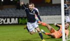 Paul McMullan spins away in celebration after notching for Dundee against Hamilton Accies. Image: SNS.