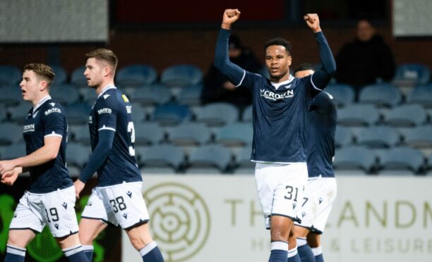 Dundee's Derick Osei celebrates after scoring in extra time to make it 3-2 against Airdrieonians. Image: SNS.