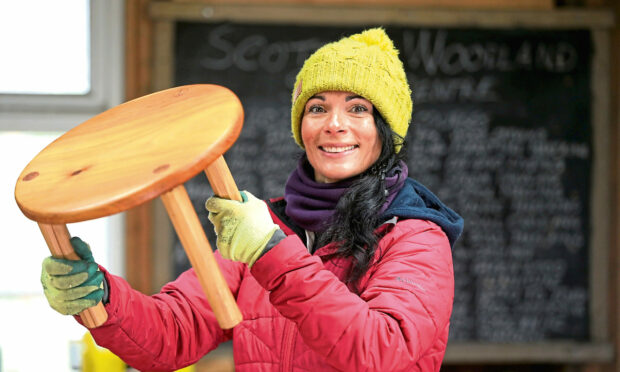 Gayle makes a three-legged milking stool at the Scottish Woodland Skills Centre near Alyth.