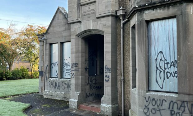 Graffiti was daubed across the house at Boyle Park in Forfar. Image: Graham Brown/DC Thomson