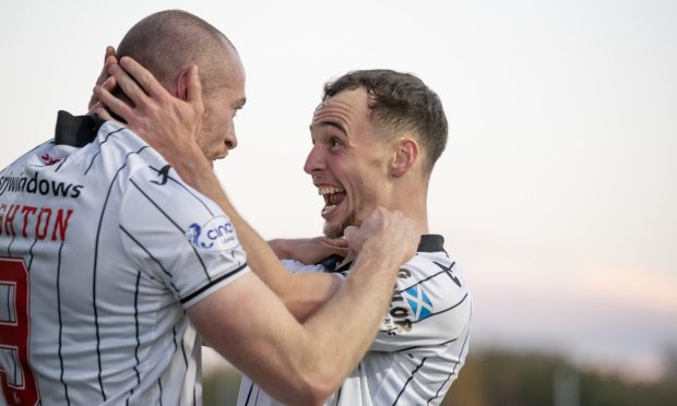 Craig Wighton and Chris Hamilton celebrate the winner against Falkirk in November 2022.