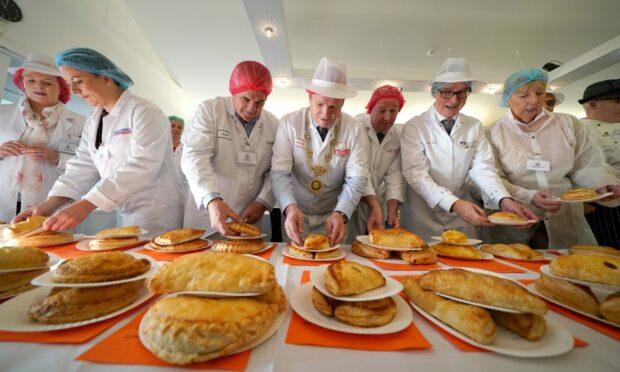 Judges at the 2022 World Scotch Pie Championship. Image: Andrew Milligan/PA Wire