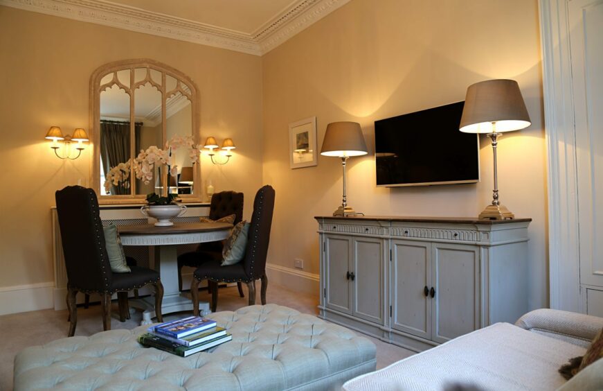 dining room with beautiful furniture and light fixtures