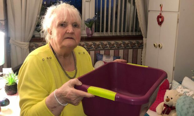 Dundee pensioner ‘dreads watching weather forecast’ as water pours into flat