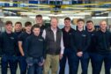CR Smith chairman Gerard Eadie (centre) with some of the Fife glazing firm's new apprentices. Image: CR Smith
