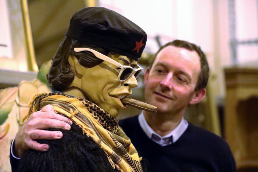 Steven Dewar with a mannequin up for auction. Image: Gareth Jennings/DC Thomson.