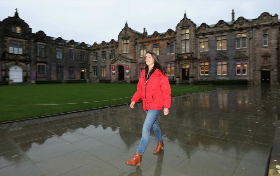 Amy walking in St Andrews.