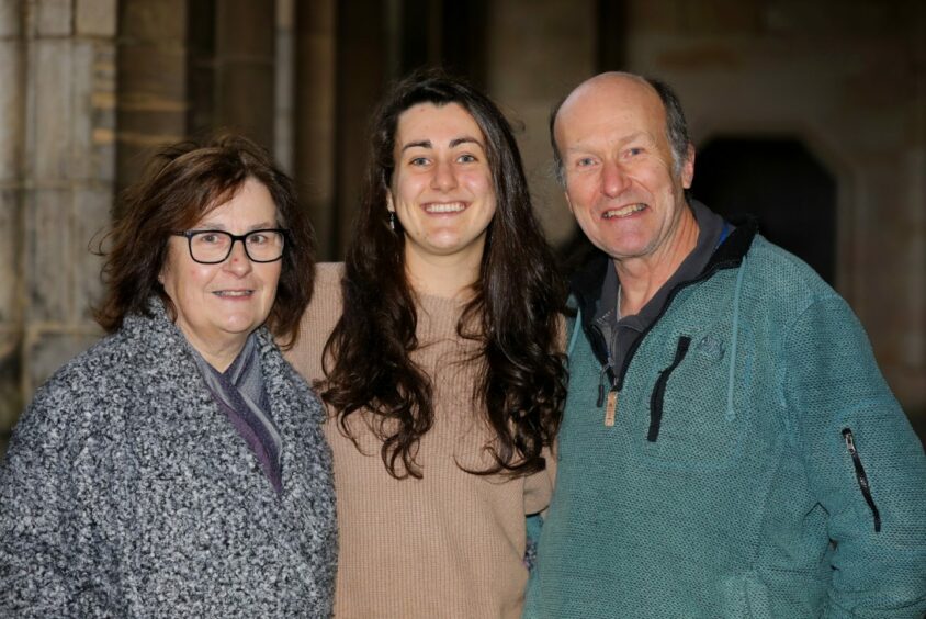 Amy with mum Celia and dad Dan. Image: Gareth Jennings/DC Thomson.