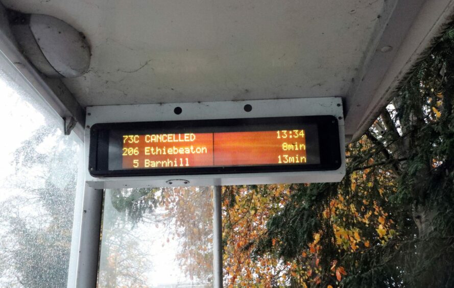 Information board shows the Stagecoach 73C bus is cancelled. 