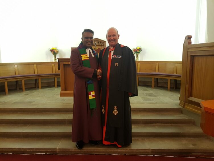 Rev Josh Milton in Kirkcaldy with Fife Presbytery clerk Rev David Coulter.