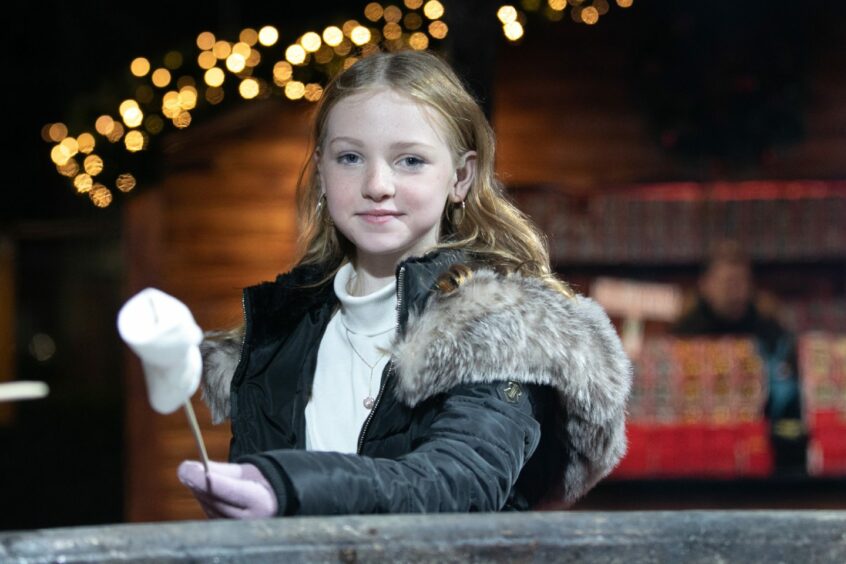 Grace Tait, 11, toasts her marshmallows. Image: Kim Cessford/DC Thomson