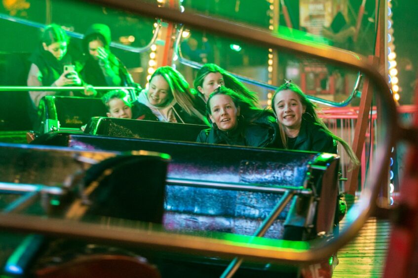 Having fun on one of the rides. Image: Kim Cessford/DC Thomson