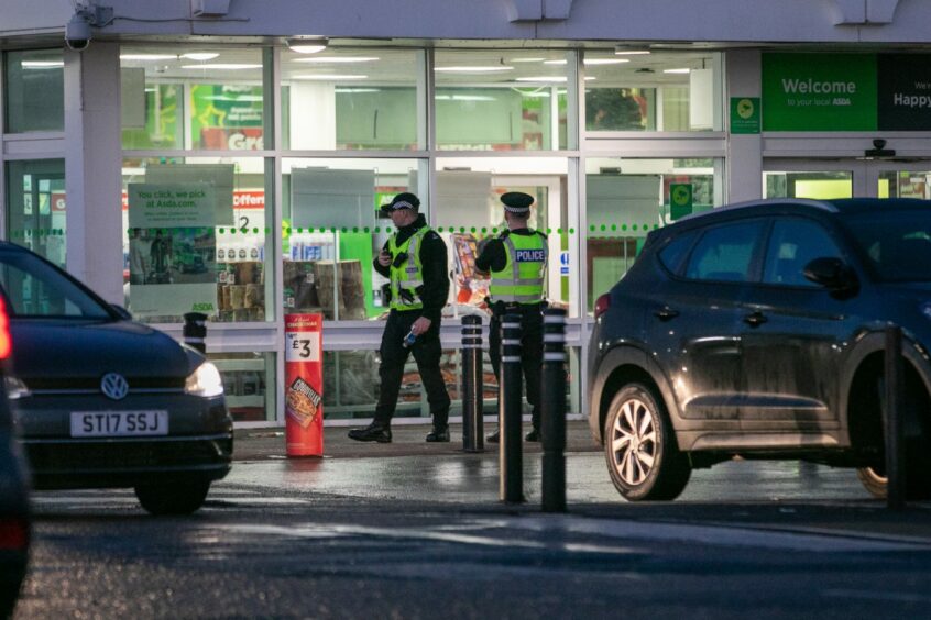 Police outside Asda in Kirkton. Image: Kim Cessford/DC Thomson.