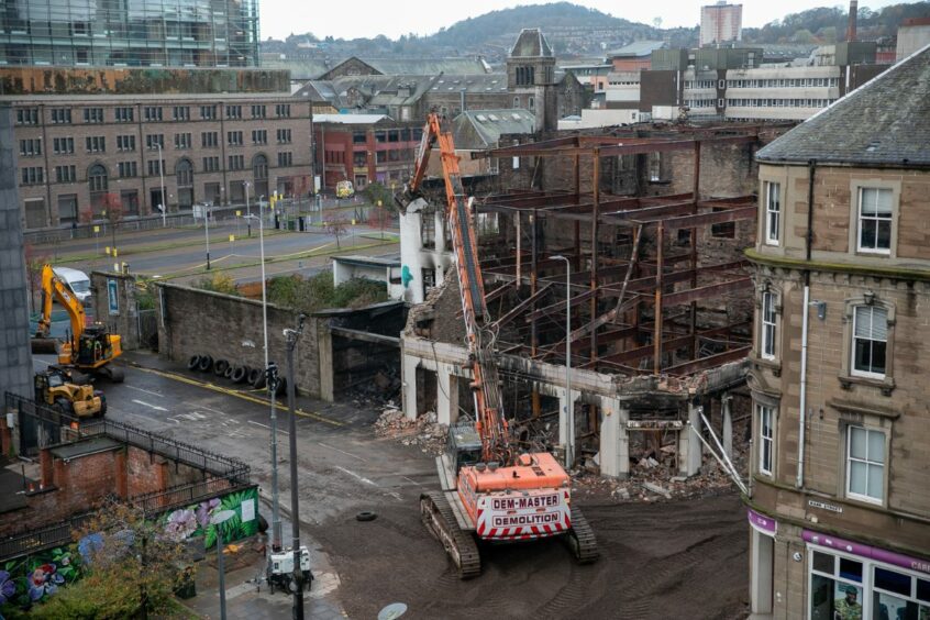 The demolition of the Robertson's building.