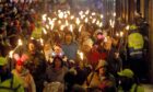 A previous torchlit procession in Dundee city centre during Christmas celebrations. Image: Kris Miller/DC Thomson.
