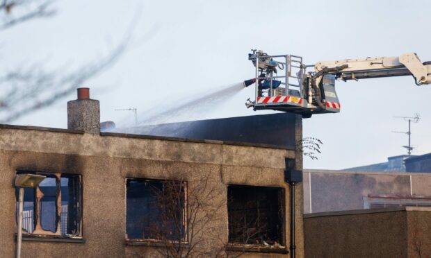 Firefighters using a height appliance to tackle the blaze at Poundstretcher.