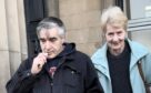 Kenny Wilkie and partner Joyce Clifford were taken to court by their neighbour Kevin Taylor.