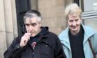 Kenny Wilkie and partner Joyce Clifford were taken to court by their neighbour Kevin Taylor.
