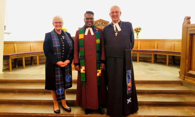 Josh Milton, centre, with Fife Presbytery Moderator Lorraine Fraser and Rt Rev Iain Greenshields, Moderator of the General Assembly of the Church of Scotland.