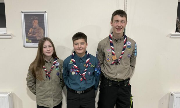 Kirsten and Jamie Brown are heading for South Korea along with Jay Leitch (centre). Image: Hillside Scout Group