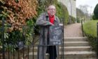 Simon Weller outside his beloved Kemback Church. Image: Supplied