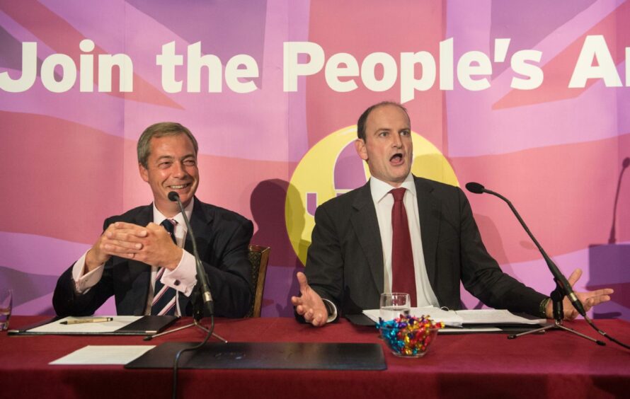 photo shows former UKIP leader Nigel Farage, left, with Douglas Carswell MP, who defected to the party from the Conservatives.