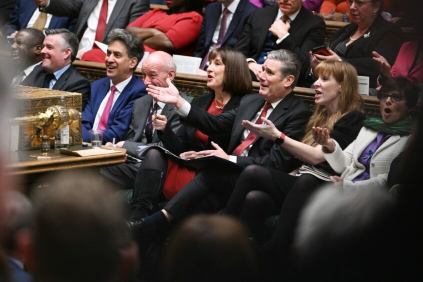 photo shows Labour front bench, including Keir Starmer and Angela Rayner, reacting to Jeremy Hunt's autumn statement.