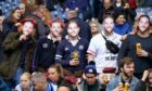 Scotland fans wearing Finn Russell masks before the game against Fiji.